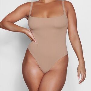 Skims Seamless square neck thong Bodysuit. Sienna